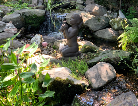 A person covering her face with her hand during therapy in Tacoma Park