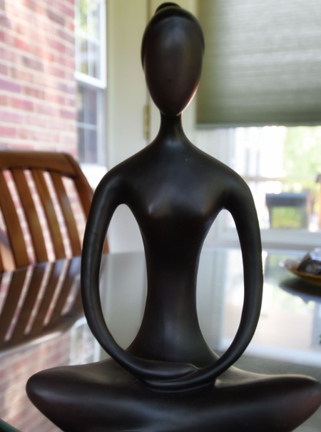 A statue on a table in a therapy room